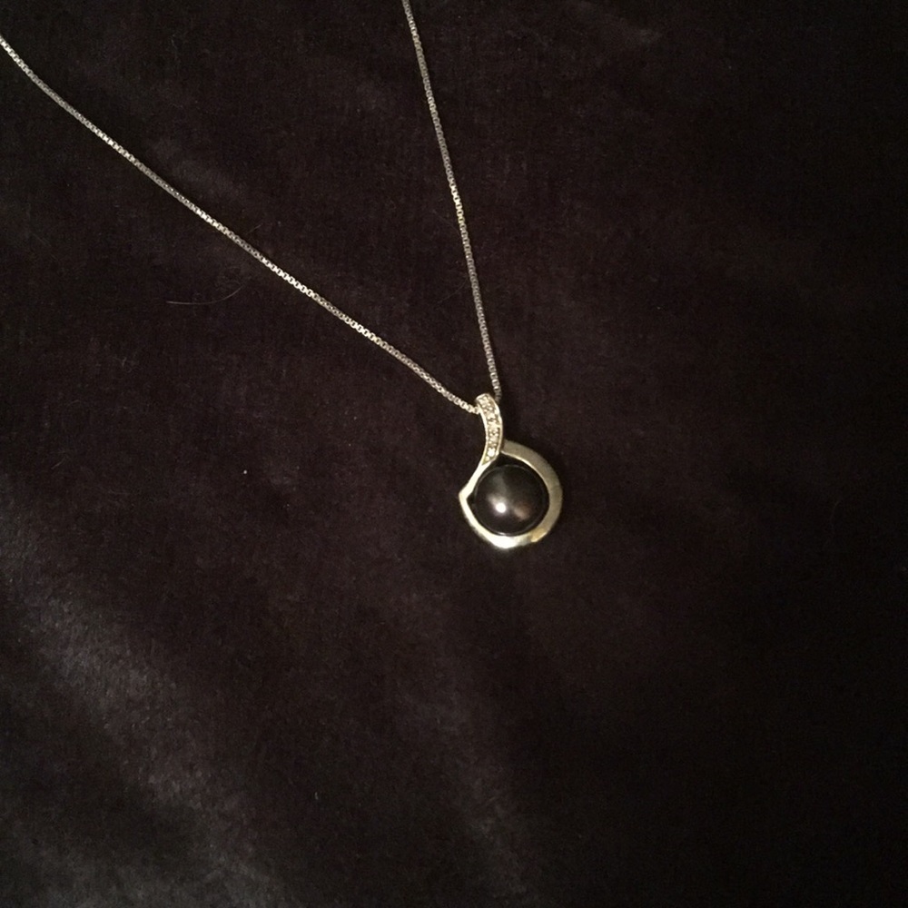 Black pearl and silver necklace